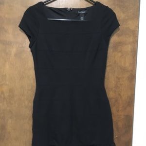 Black cap sleeve black dress with ruffle bottom